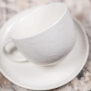 Tasse et sous-tasse à thé Ecume, Table Passion