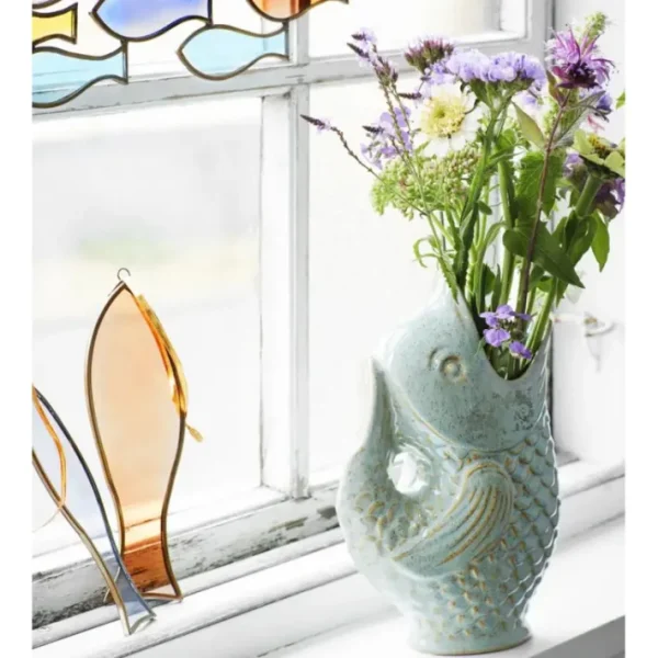 Vase Poisson, Madam Stoltz
